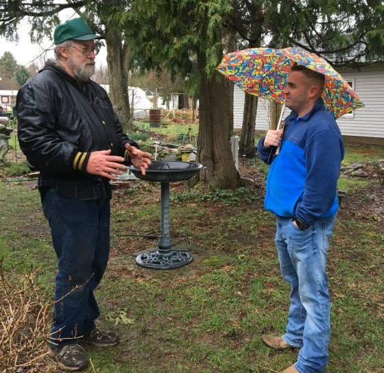 Roger Higgins and Duston McGroarty discuss growing seeds in the rain.