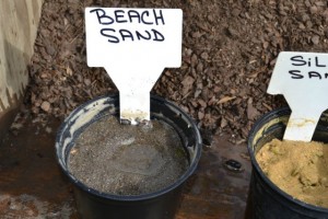 Testing beach sand and silica sand for drainage.
