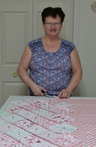 Pam working away in her sewing room.