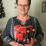 Pam McGroarty, showing off pruning shears.