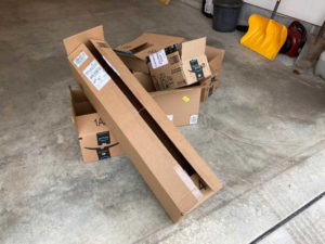 Use Amazon boxes for weed control in the garden.